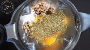 Italian seasoning added to eggs, baking powder, and cooked, ground turkey in a blender.