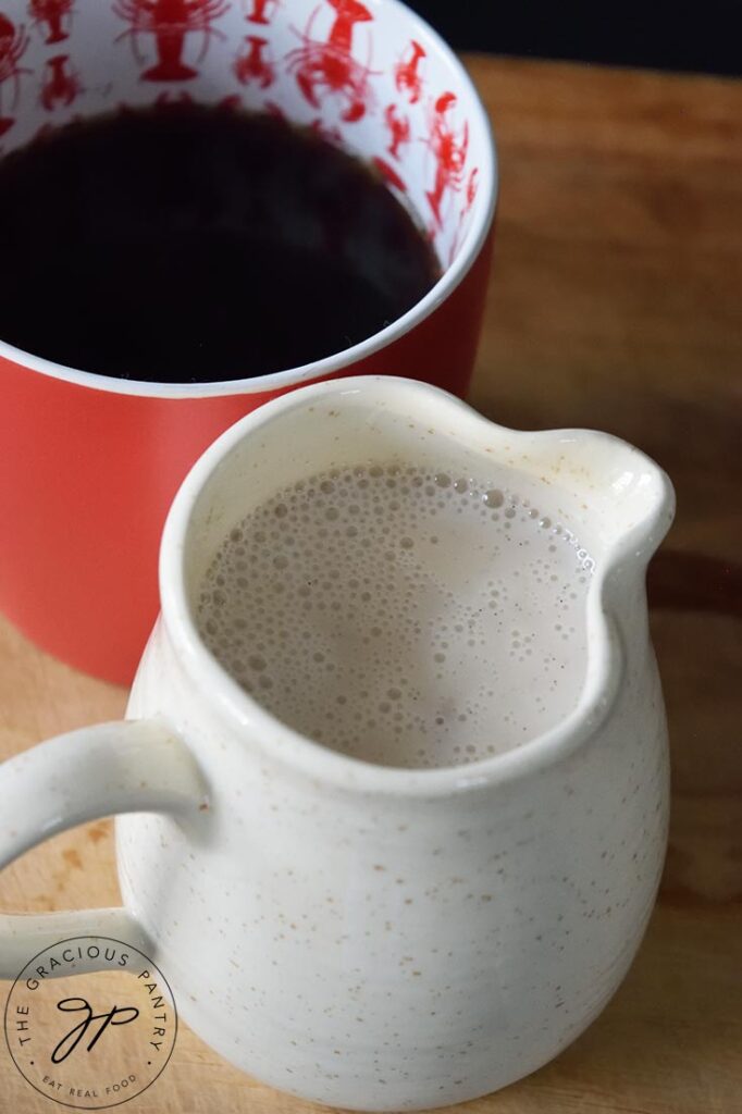 A pitcher full fo French vanilla coffee creamer.