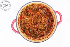 Cooked Lentil Sloppy Joes filling sitting in a pot.