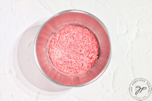 The mixed Raspberry Coconut Truffles filling in a mixing bowl.
