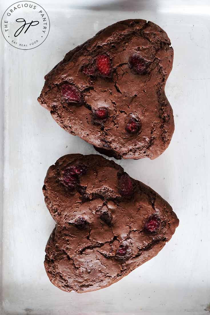 Two just-baked Healthy Chocolate Raspberry Cakes from overhead.