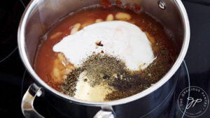 Healthy Tomato Soup Recipe ingredients sitting in a pot.