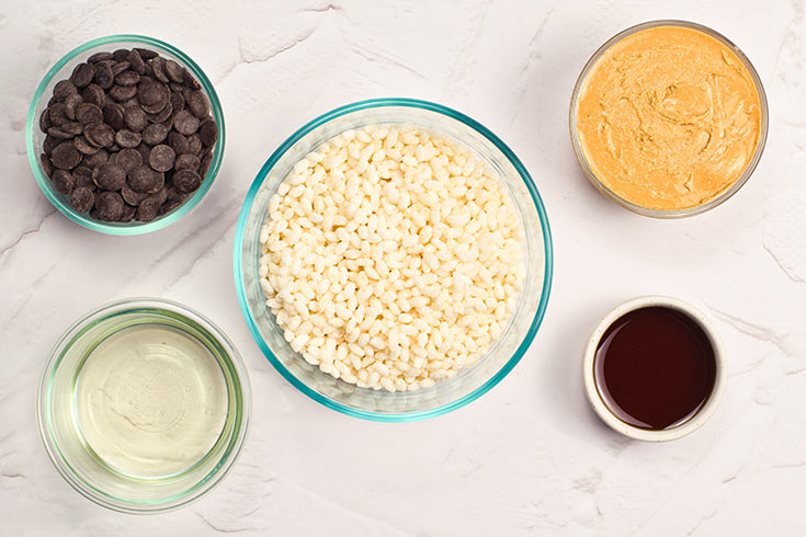 Homemade Crunch Bars Recipe ingredients in individual glass bowls.