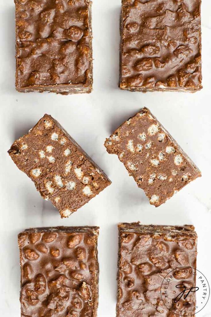 An overhead view looking down on six Homemade Crunch Bars.