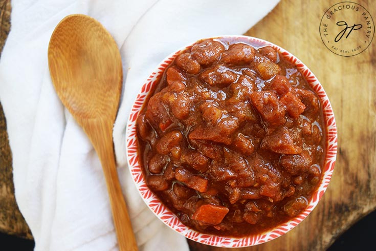 An overhead view of a small bowl filled with Ranch Style Beans.