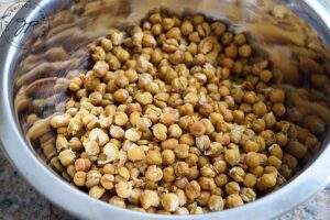 Just roasted chickpeas in a mixing bowl.