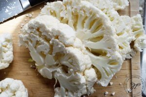 A heat of cauliflower, sliced into thick steaks.