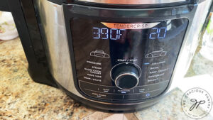 And air fryer display panel set to 390 degrees for 20 minutes.