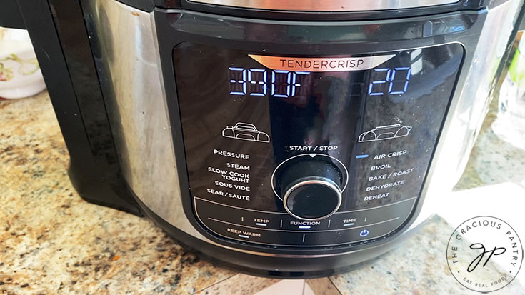 And air fryer display panel set to 390 degrees for 20 minutes.