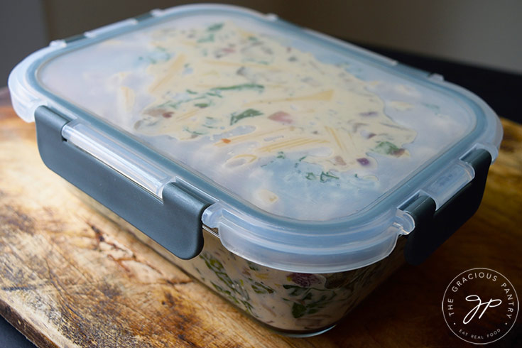 Creamy Kale And Mushroom Pasta packed in an airtight container for storage.
