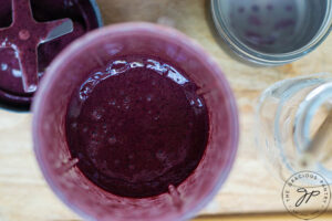 Just blended Kale Blueberry Smoothie still in a blender tumbler.