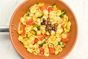 Orecchiette Pasta Salad sitting finished in a skillet.