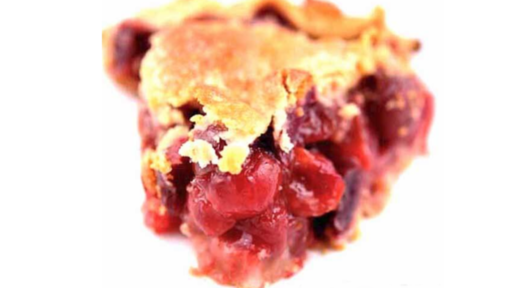 A slice of cherry pie on a white background.