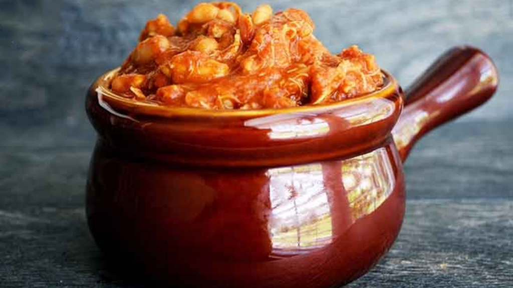 A crock loaded with white chicken chili.