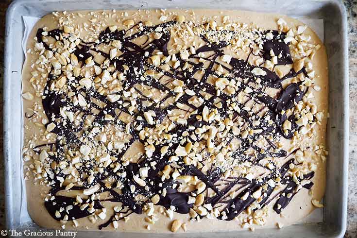 Chocolate Peanut Butter Frozen Yogurt Bark frozen on a sheet pan.