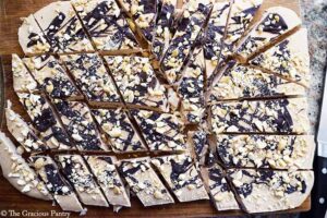 A block of Chocolate Peanut Butter Frozen Yogurt Bark fully cut into pieces.