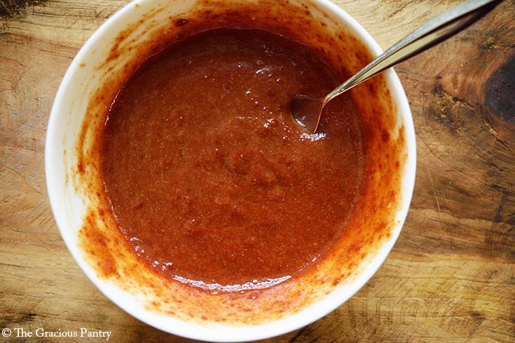 Copycat Chick Fil A Honey BBQ Sauce ingredients mixed together in a mixing bowl.