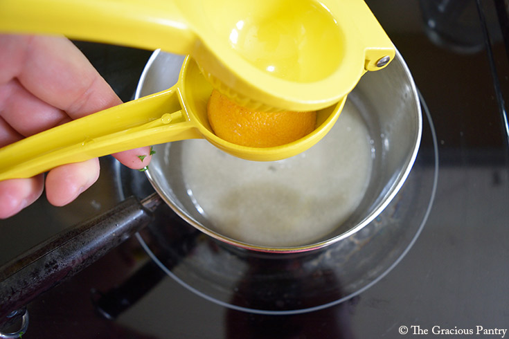 Adding fresh lemon juice to melting butter.