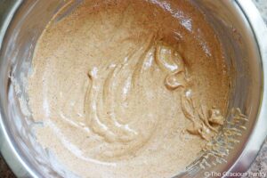 Yogurt marinade mixed together and sitting in a mixing bowl.