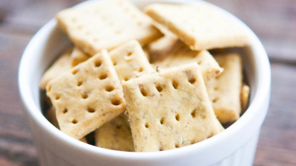 A bowl filled with crackers.