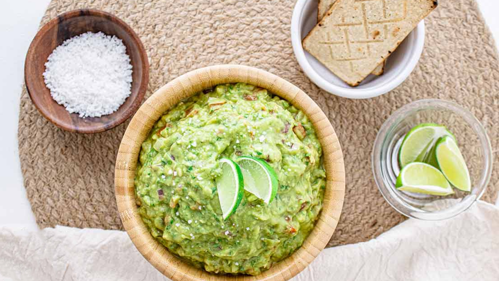 An overhead view of a bowl of guacamole.