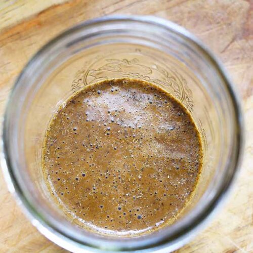 Looking down into a mason jar partially full of this Healthy Balsamic Vinaigrette Recipe