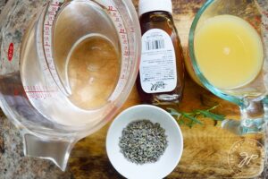 Lavender Lemonade Recipe ingredients gathered on a cutting board.