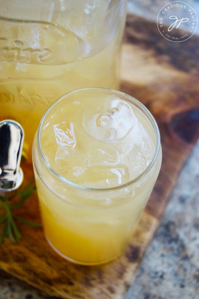 An up close view of a glass filled with ice and Lavender Lemonade.