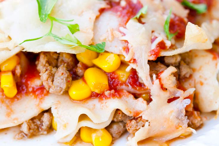 A closeup of a piece of Mexican lasagna.