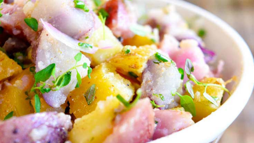 A closeup of a bowl of no-mayo potato salad.