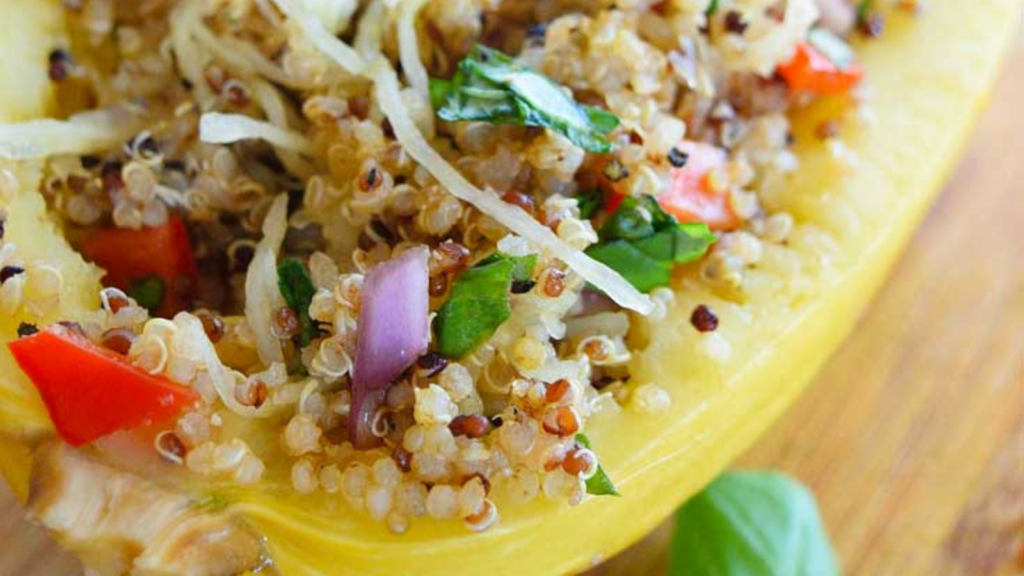 A closeup of a quinoa stuffed spaghetti squash.