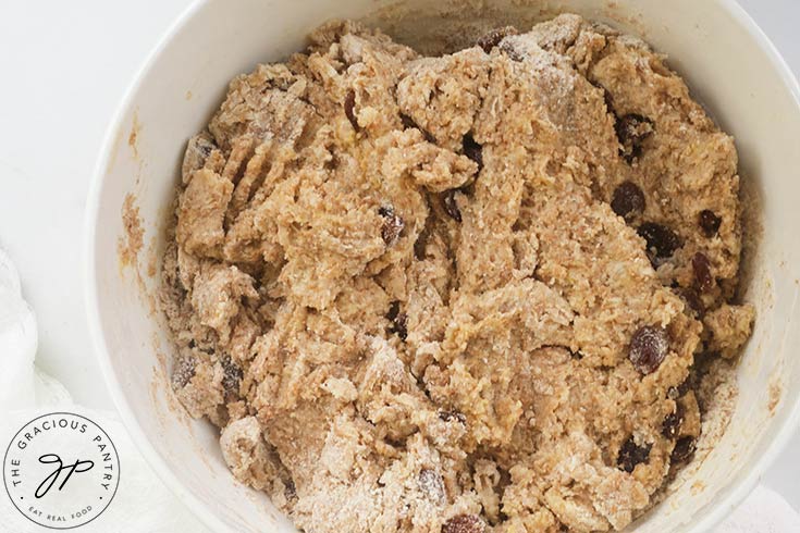 Raw scone dough mixed in a mixing bowl.