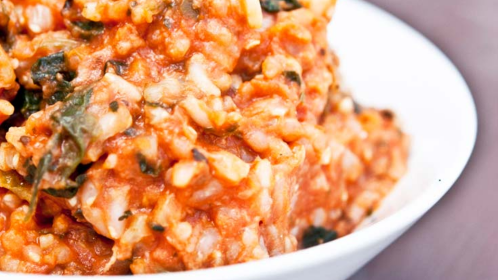 A closeup of a white bowl filled with spaghetti rice.