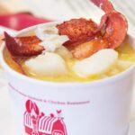 A cup of seafood stew from the Red Barn.