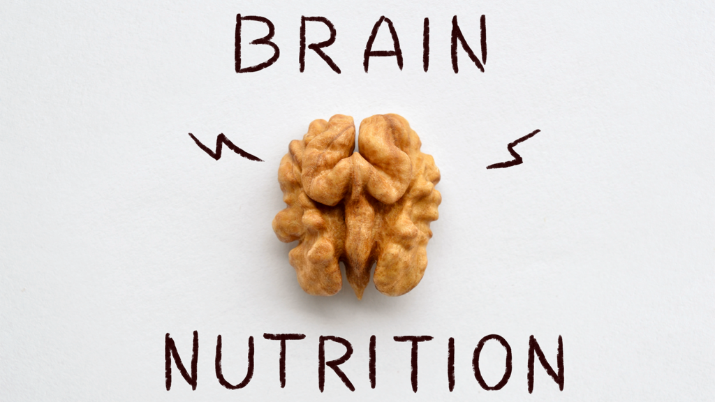 A walnut half with text above and below that says, "Brain Nutrition".