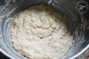 Just mixed Whole Wheat Focaccia Bread dough in a mixing bowl.