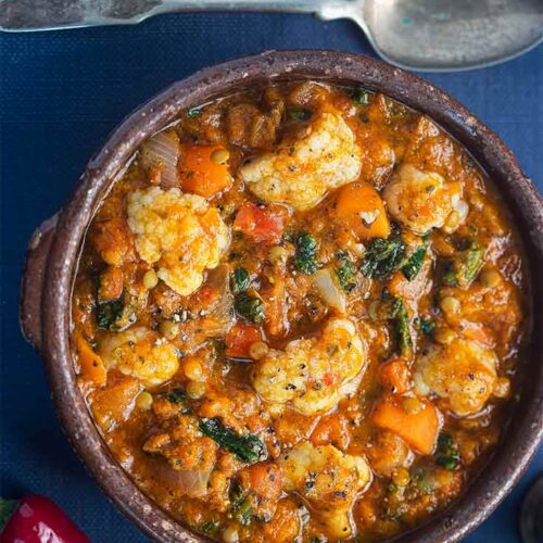 A crock filled with curried lentils.