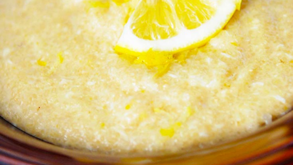A closeup of a bowl of lemon porridge.