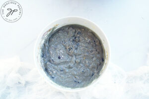 Blueberry Corn Muffins batter in a white mixing bowl.