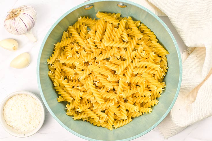 Dry pasta in a pot.