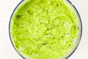 Blended Avocado Pasta sauce in a blender tumbler.