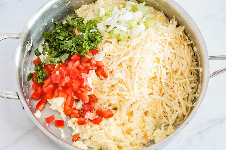 Taquito filling ingredients in a skillet.