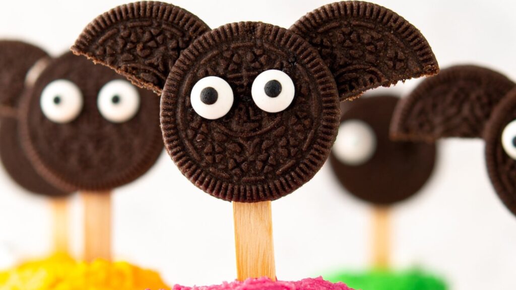 Oreos made into bats on a popsicle stick for cupcake toppers.