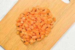 Chopped carrots on a cutting board.