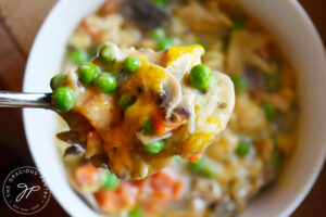 A serving of Tuna Noodle Casserole in a white bowl.