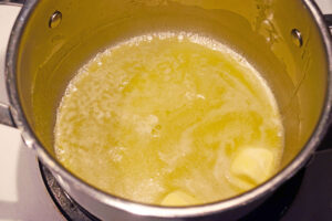 Melted butter in a pot.