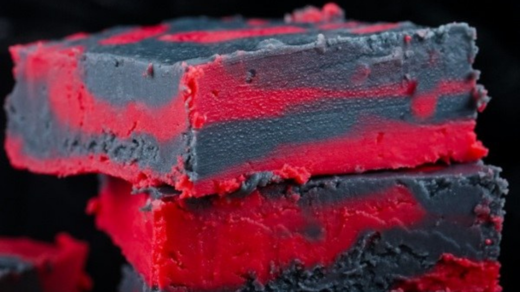 A closeup of a stack of vampire fudge squares.