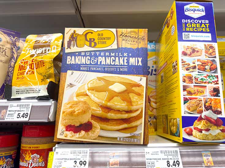 Boxes of baking mix on a store shelf.