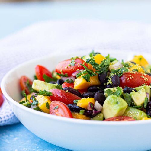 Front view of a bowl of black bean salad.
