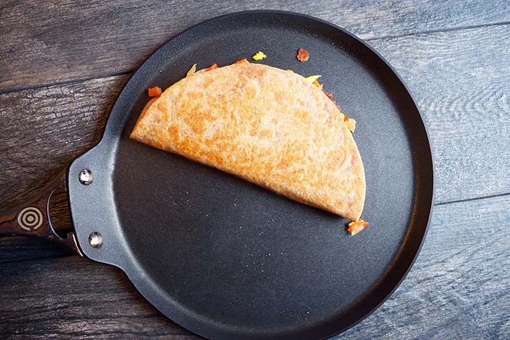 A Breakfast Quesadilla shows the browning on the outside of the quesadilla after cooking.